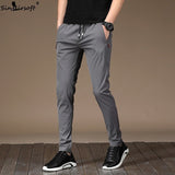 Men's Autumn Casual Sport Pants Men Elastic Nine Pants Small Feet Joggers Pants Drawstring Beam Pants Versatile Trousers Homme